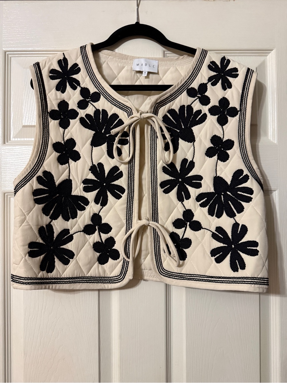 MABLE Cream Quilted Floral Tie-Front Vest with Black Appliqué